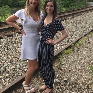 Navy jumpsuit with white stripes, worn once